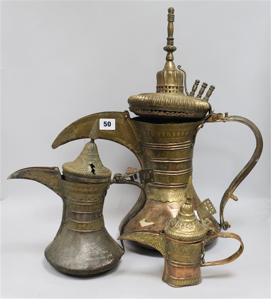 Three Islamic copper jugs